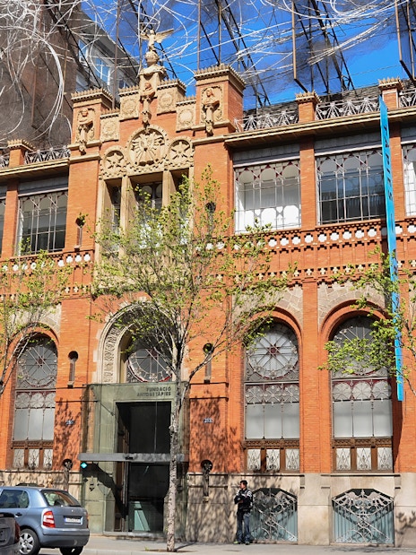 Fundació Antoni Tàpies building facade in Barcelona with modern art installation.
