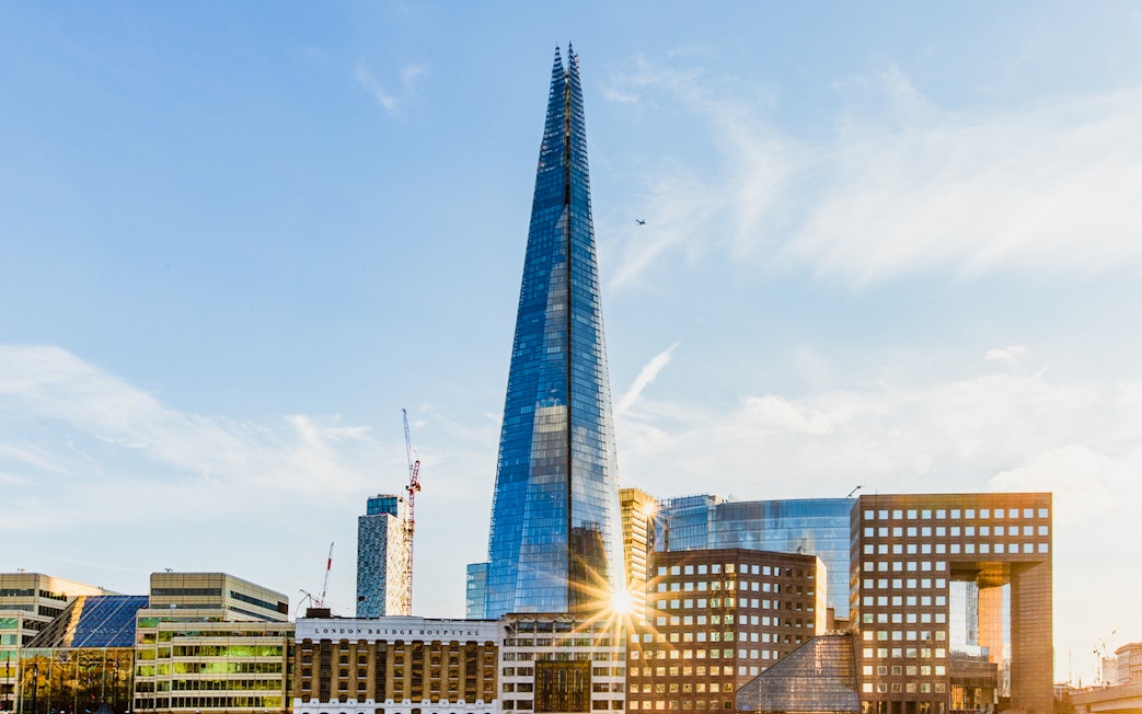 The Shard skyscraper in London with surrounding cityscape.
