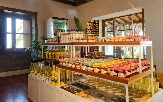 Gran Canaria shop with banana products and local goods on display shelves.