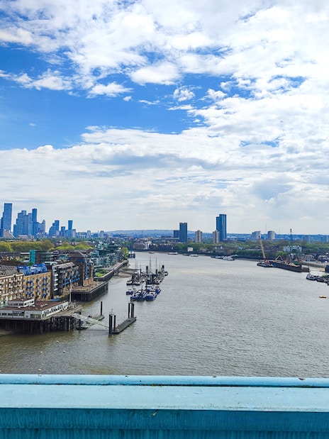 London skyline view from Tower Bridge over the Thames River.