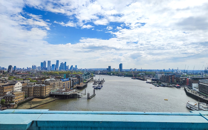 London skyline view from Tower Bridge over the Thames River.