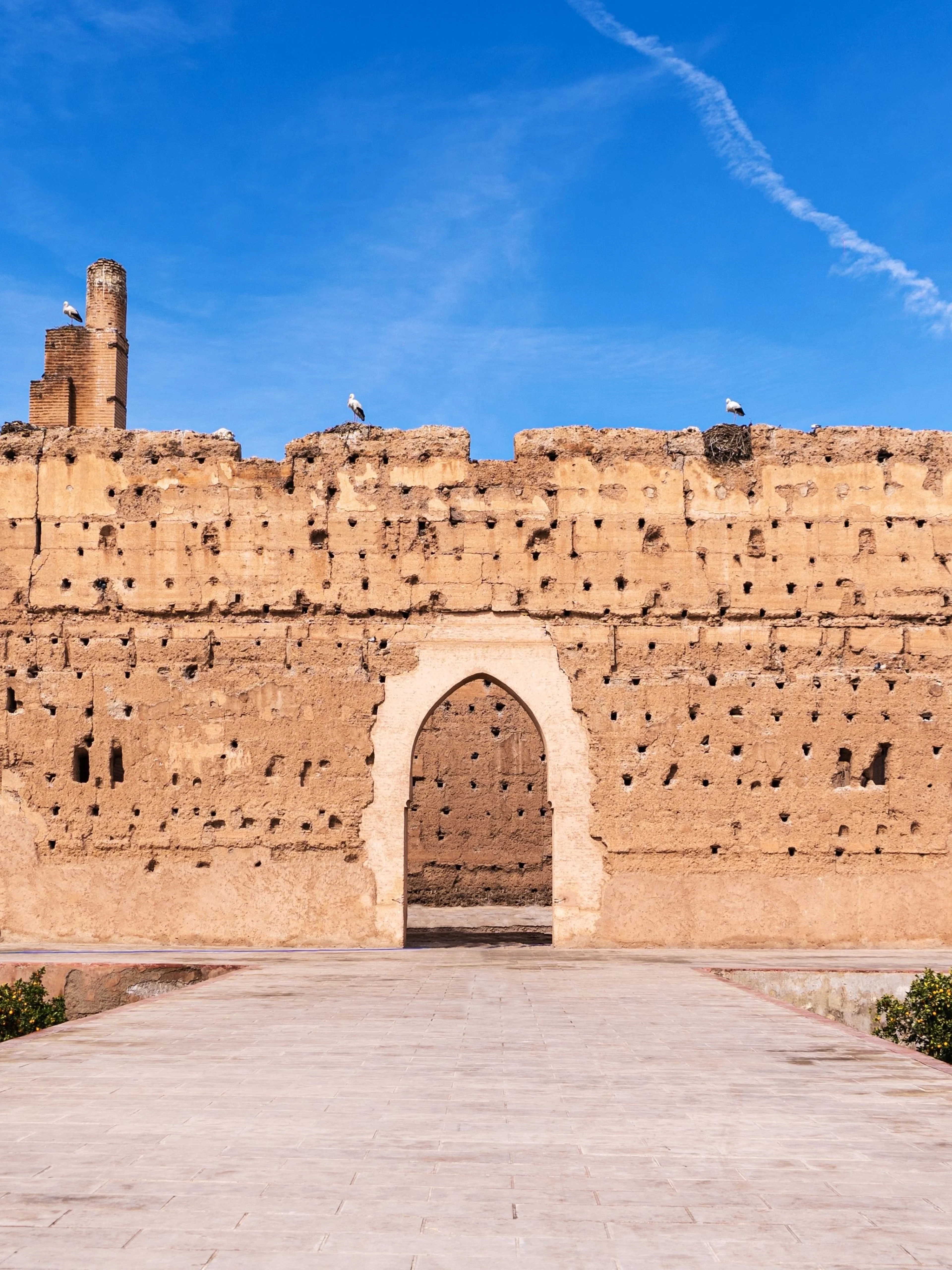 El Badi Palace ruins with storks on the walls, Marrakech, Morocco.