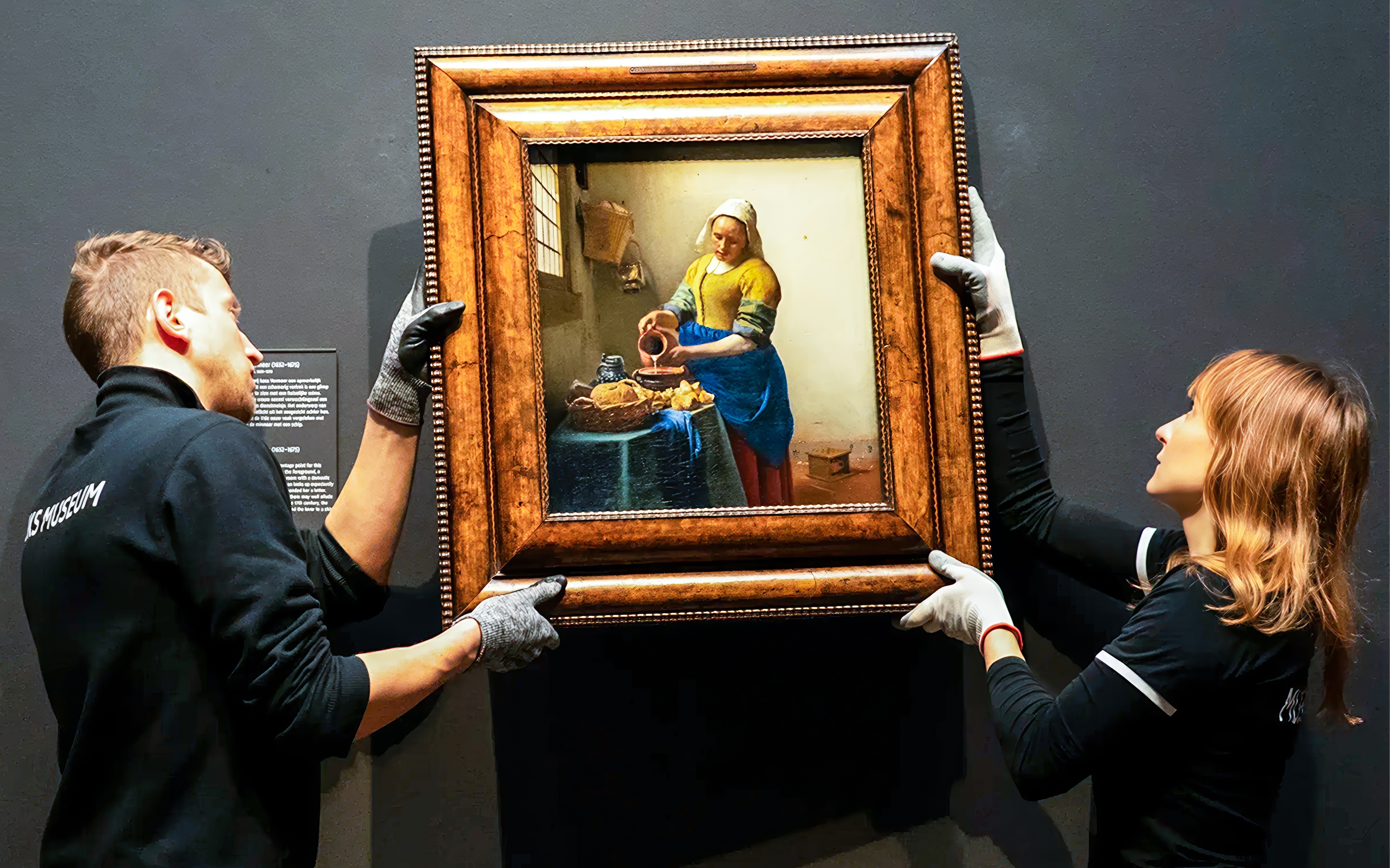 Johannes Vermeer painting being installed at Rijksmuseum exhibit, Amsterdam.