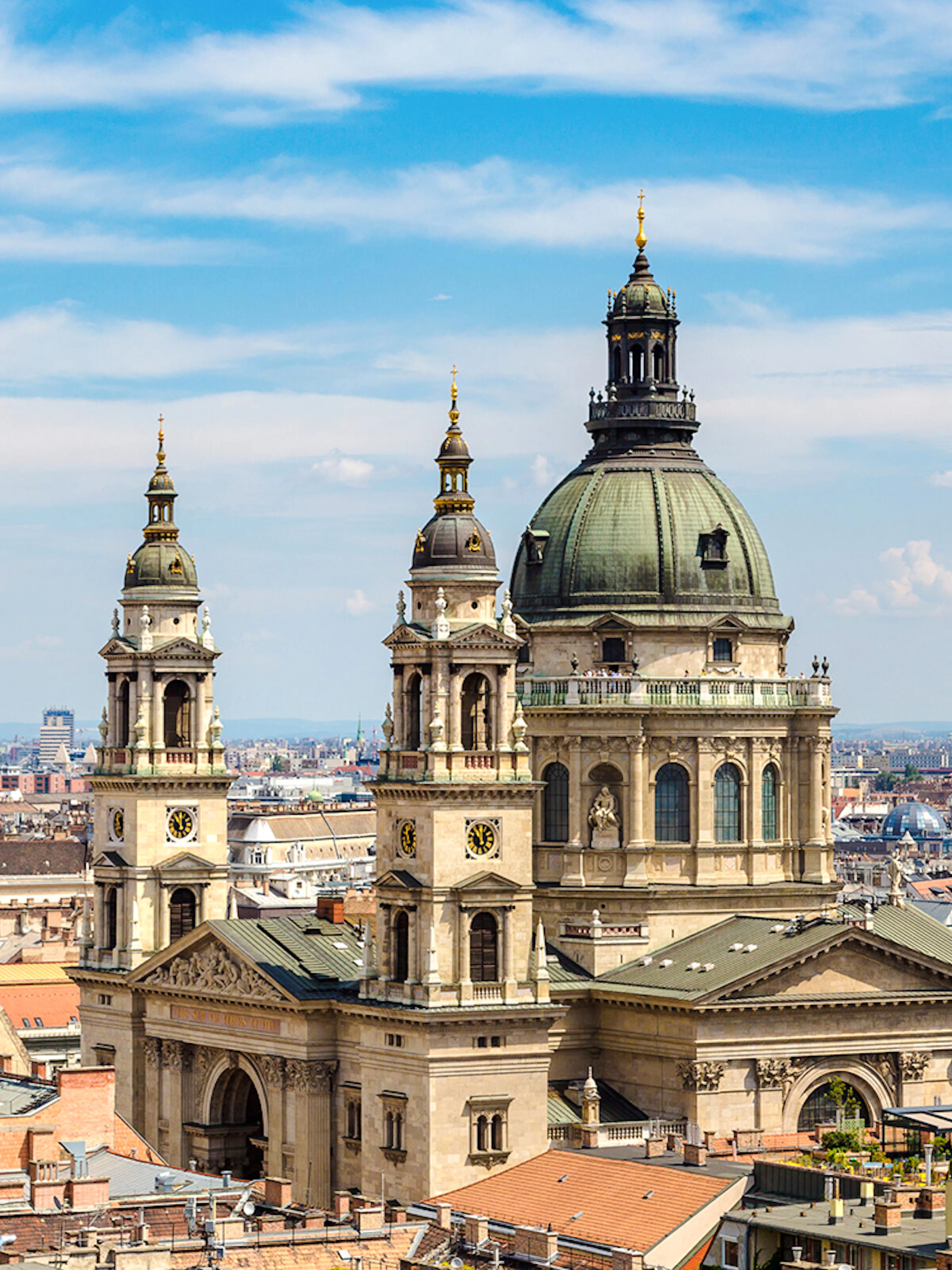 St. Stephen's Basilica with Budapest skyline during walking tour.