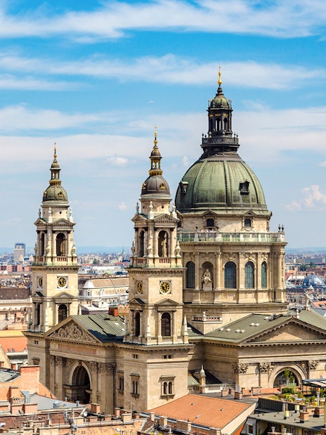 St. Stephen's Basilica with Budapest skyline during walking tour.