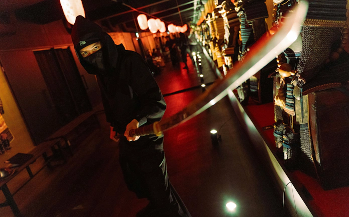 Samurai wielding a sword inside the Samurai & Ninja Museum, Tokyo.