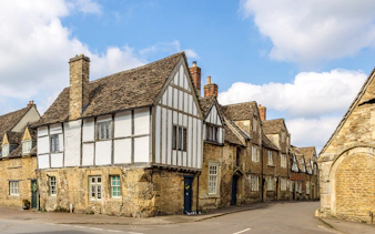 Historic stone cottages in Lacock village, Wiltshire, England.