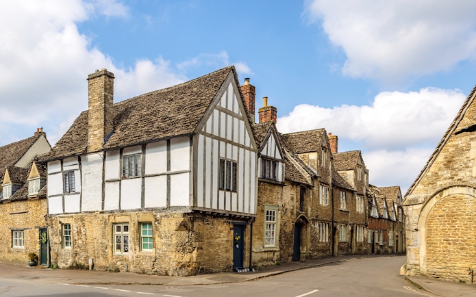 Historic stone cottages in Lacock village, Wiltshire, England.