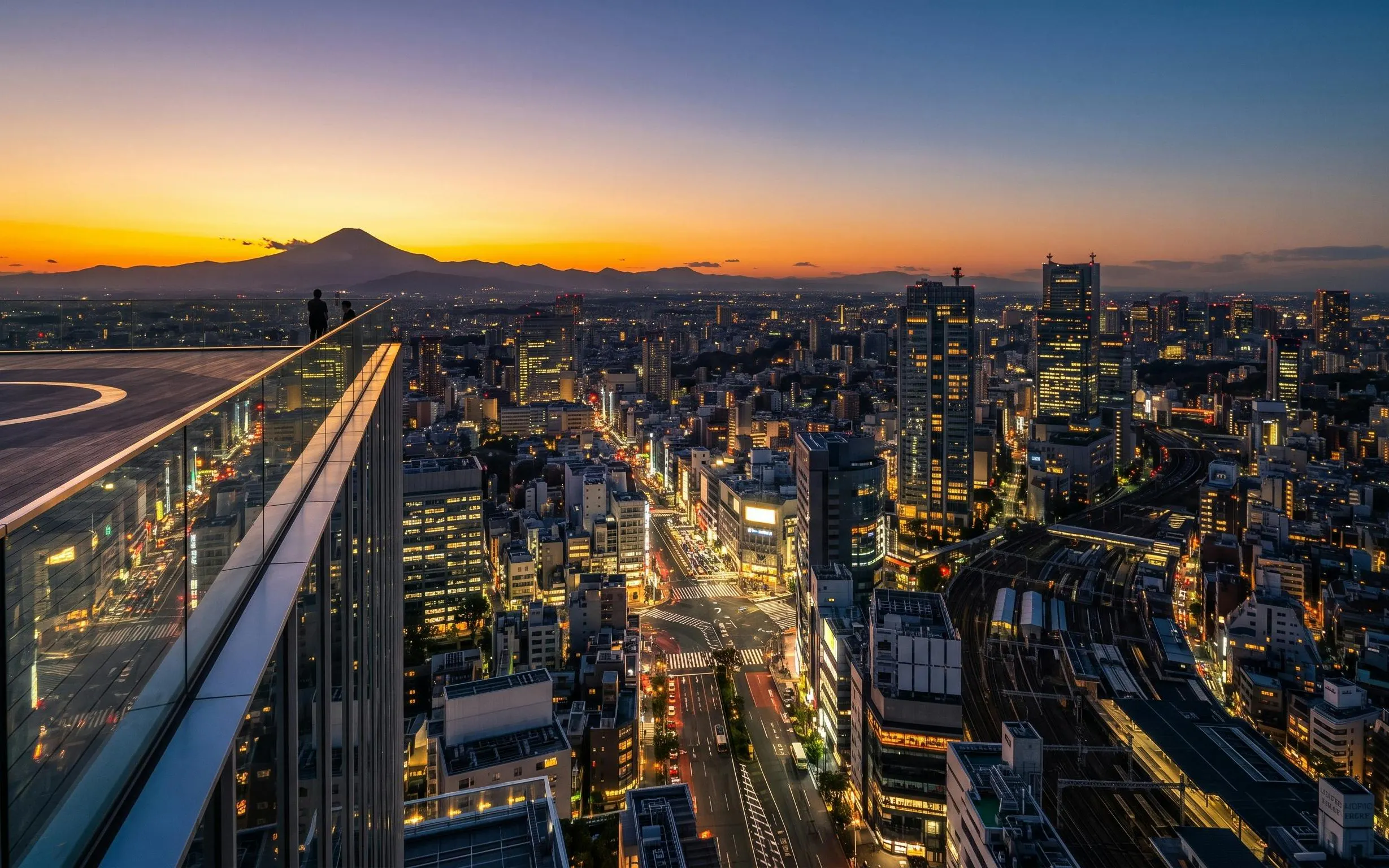 Tokyo skyline at sunset from Shibuya Sky, overlooking Shibuya Scramble Crossing.