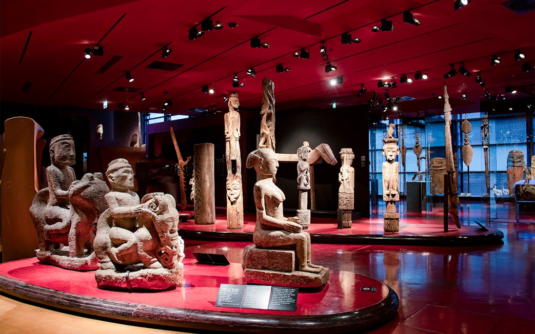 Sculptures and artifacts displayed at Musee du Quai Branly, Paris.