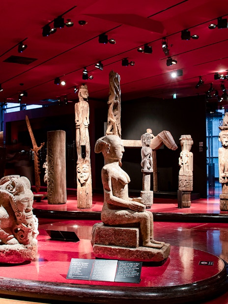 Sculptures and artifacts displayed at Musee du Quai Branly, Paris.