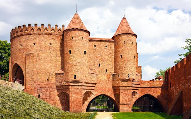 Warsaw Barbican with red brick towers on a private walking tour in Warsaw.