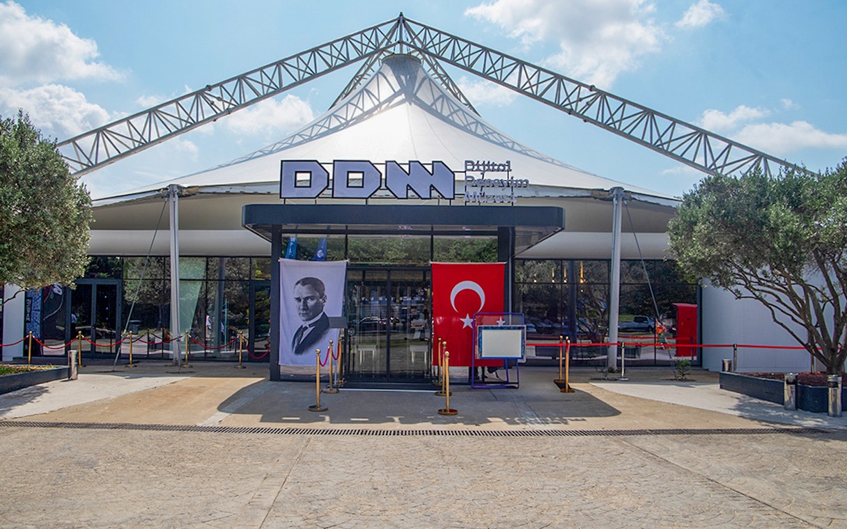 Istanbul Digital Experience Museum entrance with Turkish flag and portrait.