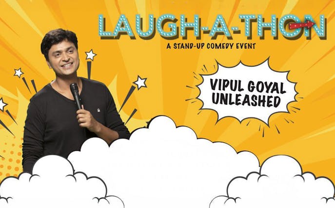 Stand-up comedian performing at Laugh-a-thon event in Dubai.
