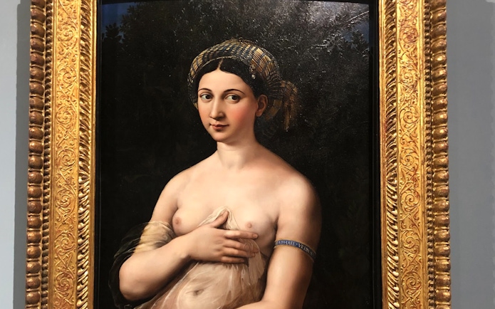 Raphael's "La Fornarina" portrait in ornate gold frame.