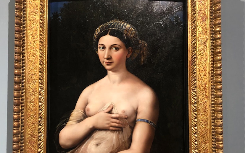 Raphael's "La Fornarina" portrait in ornate gold frame.