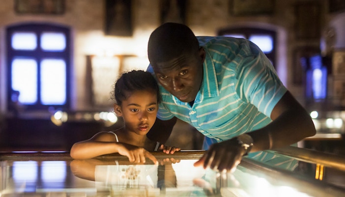 A family at the Old Dubai exhibition at Dubai Frame