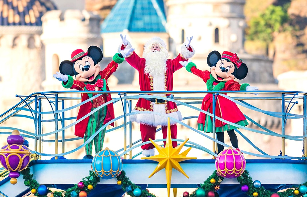 Mickey and Minnie Mouse with Santa at Tokyo Disney Resort parade.