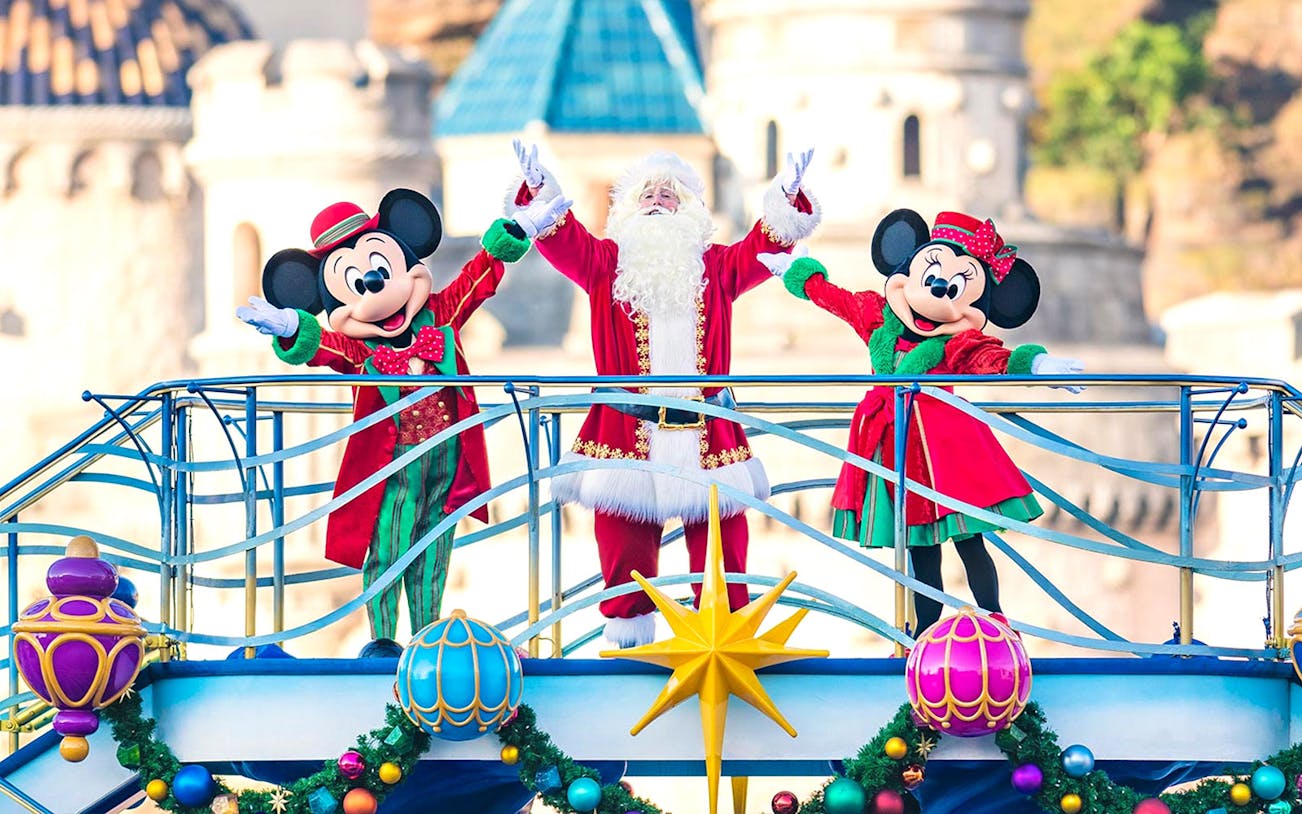 Mickey and Minnie Mouse with Santa at Tokyo Disney Resort parade.