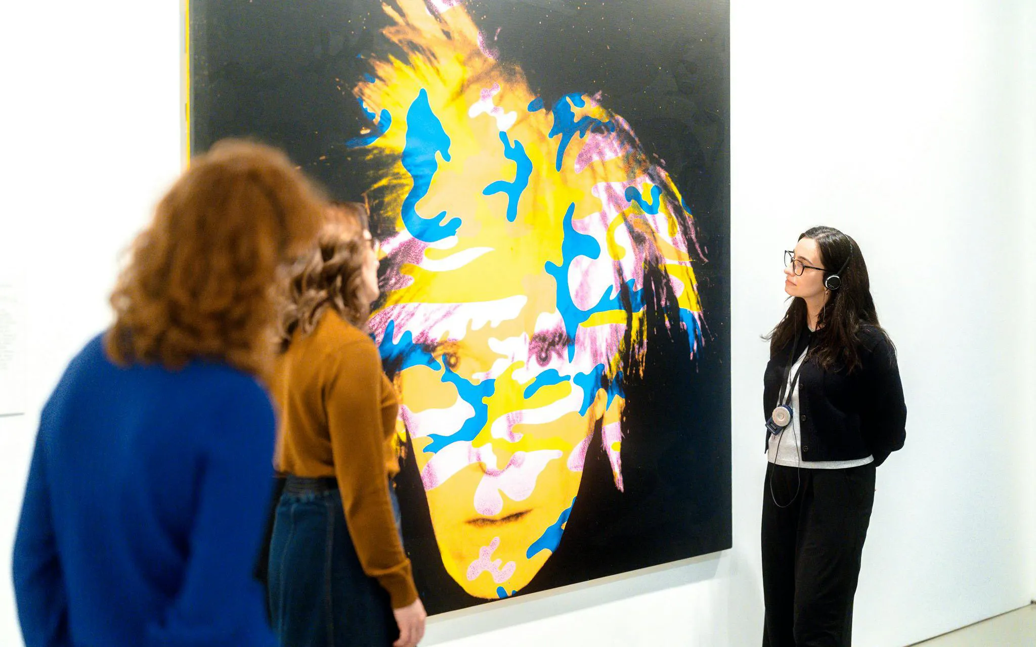 Visitors viewing colorful artwork at the National Gallery of Victoria during the Best of NGV Experiences Tour.