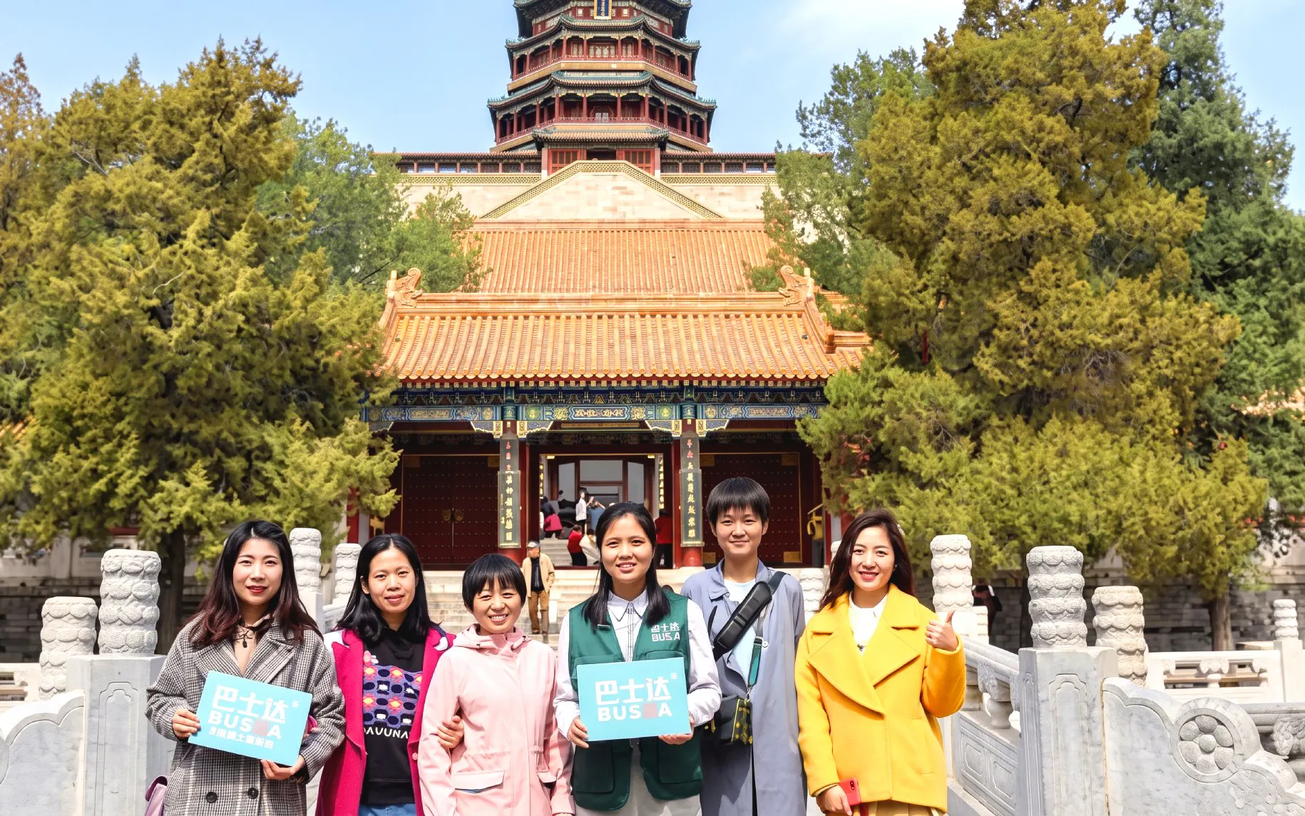 Visitors in front of the Tower of Buddhist Incense at the Summer Palace, Beijing.