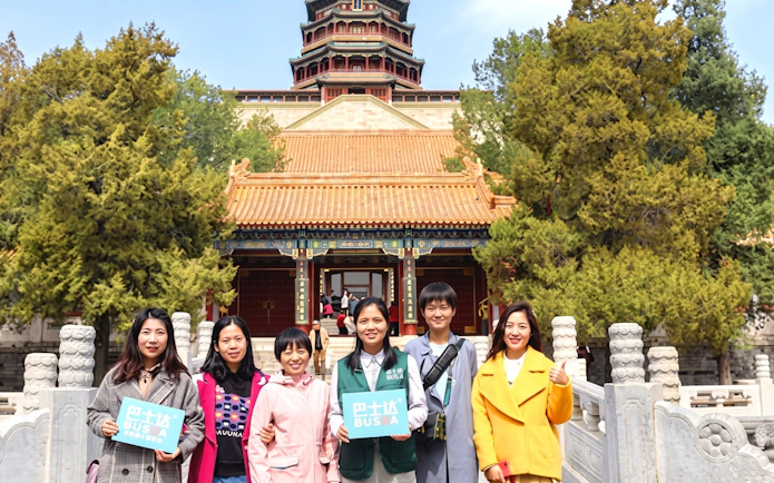 Visitors in front of the Tower of Buddhist Incense at the Summer Palace, Beijing.