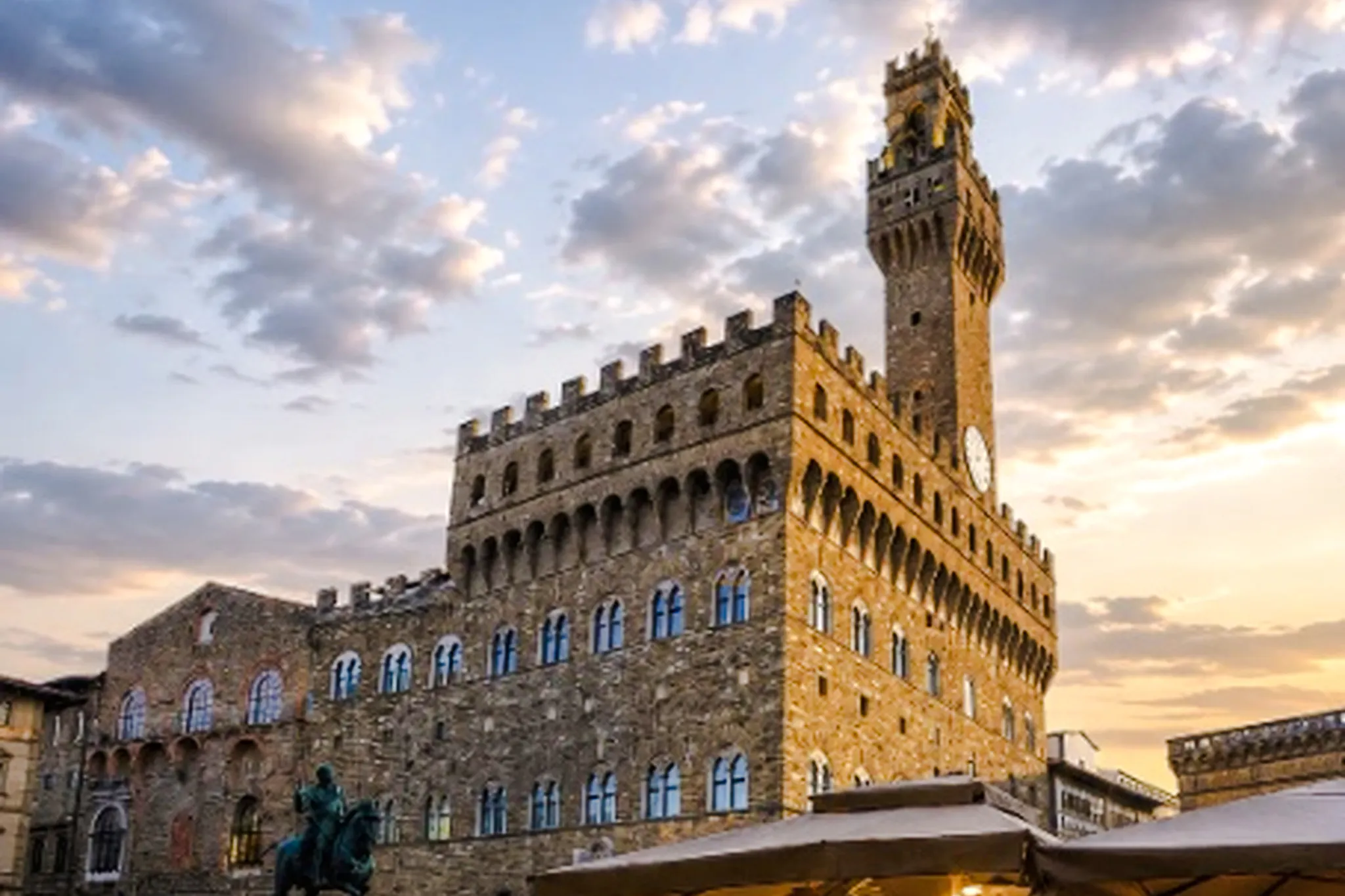 Palazzo Vecchio at sunset, Florence, featured in the Medici Power Story tour.