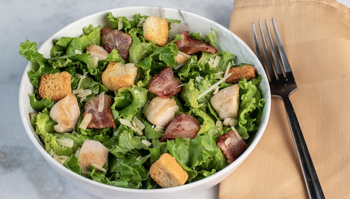 Caesar salad with croutons and parmesan at a New York City lunch cruise.