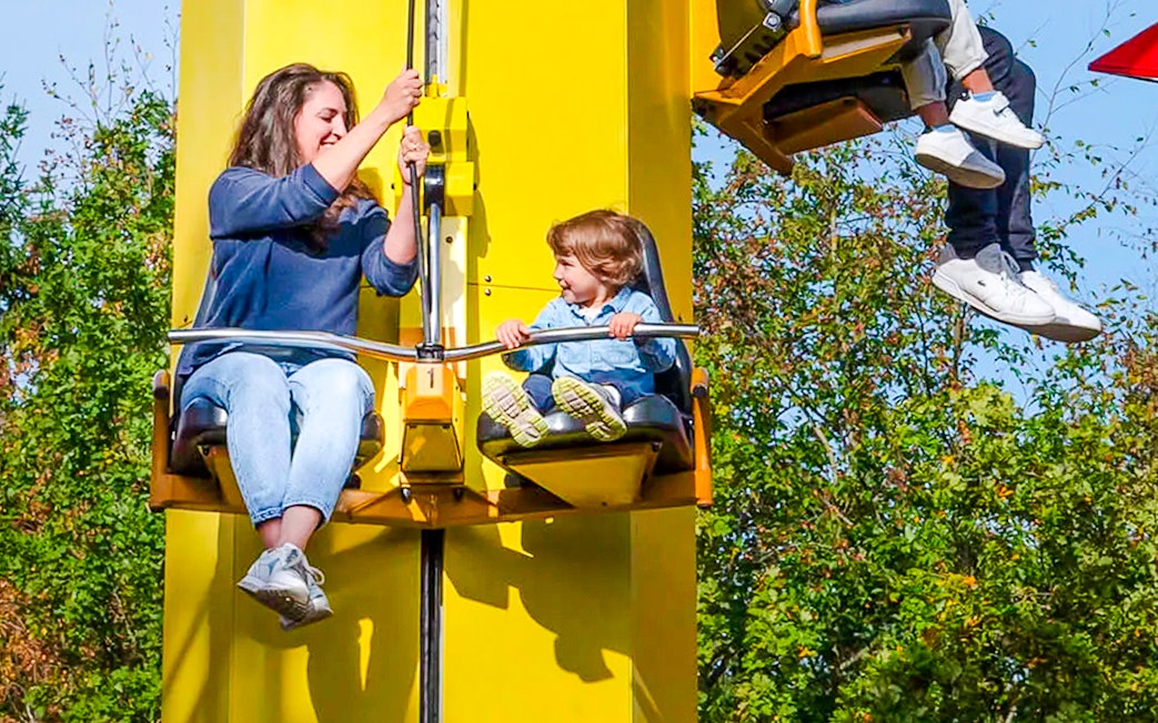 Guests on a ride at LEGOLAND Deutschland, enjoying the experience.