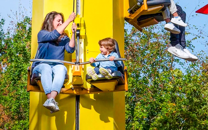Guests on a ride at LEGOLAND Deutschland, enjoying the experience.