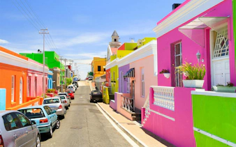 Colorful houses lining a street in Bo-Kaap neighborhood, Cape Town, South Africa.