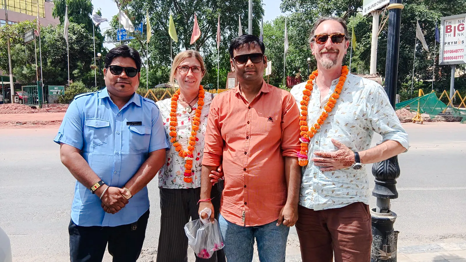 Tourists with garlands in Delhi during the 3-day Golden Triangle tour.