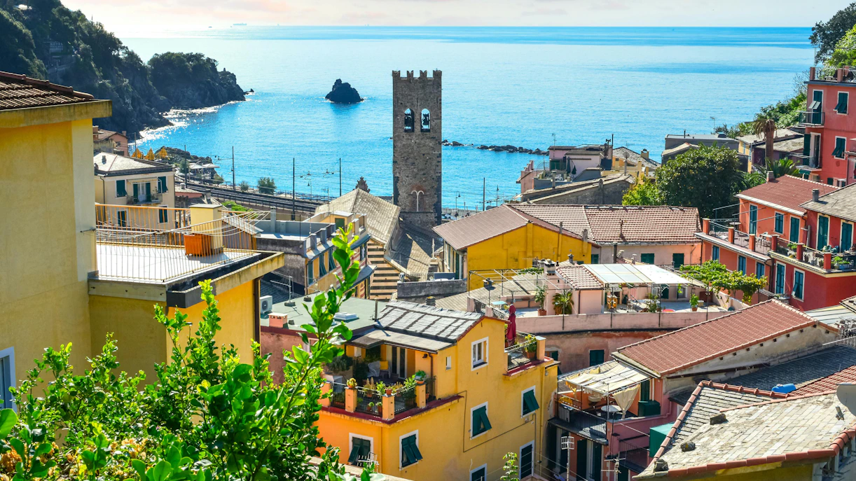 Monterosso al Mare rooftops with church tower and Ligurian Sea, Cinque Terre, Italy.