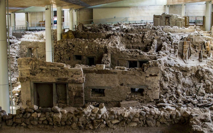 Akrotiri Archaeological Site ruins with ancient structures and excavation details.