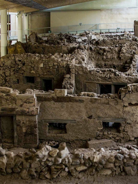 Akrotiri Archaeological Site ruins with ancient structures and excavation details.