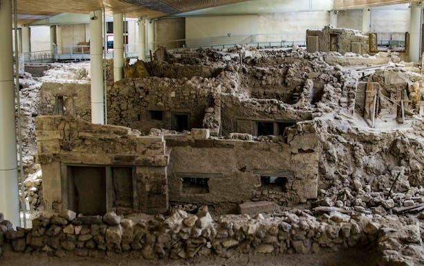 Akrotiri Archaeological Site ruins with ancient structures and excavation details.