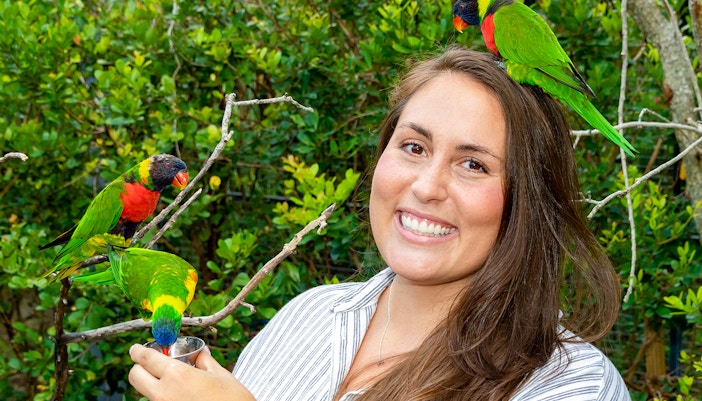 Guest feeding Parrots at Zoo Miami