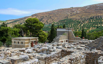 Knossos Palace ruins with surrounding landscape in Heraklion, Crete.