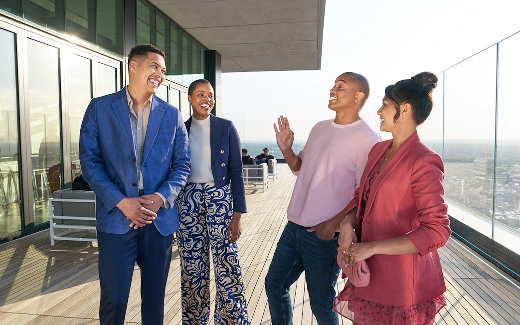 Group enjoying rooftop view in Boston.