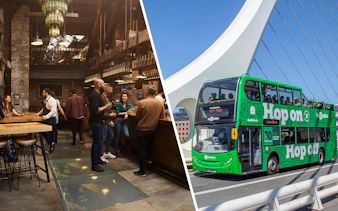 Visitors tasting whiskey at Jameson Distillery bar, Dublin; green tour bus on bridge.