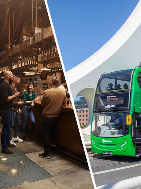 Visitors tasting whiskey at Jameson Distillery bar, Dublin; green tour bus on bridge.
