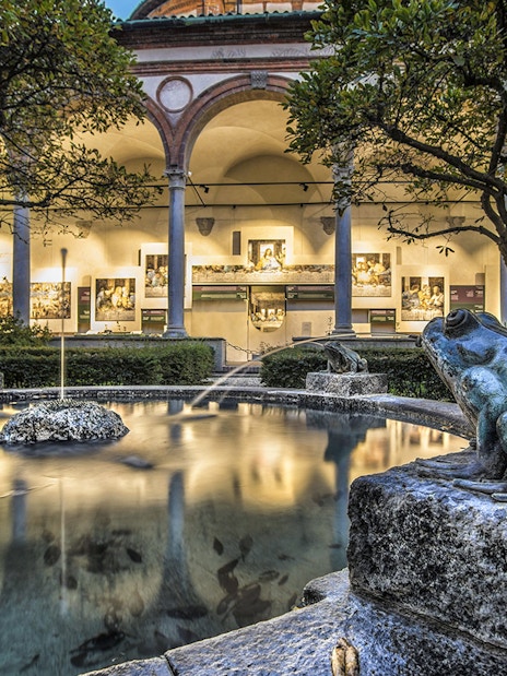 Courtyard with frog statues and fountain near Da Vinci's Last Supper in Milan.