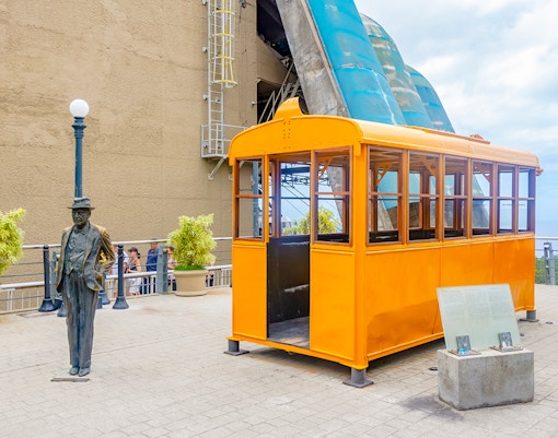 Sugarloaf Mountain cable car station historic exhibit in Rio de Janeiro, Brazil, showcasing vintage transportation artifacts.