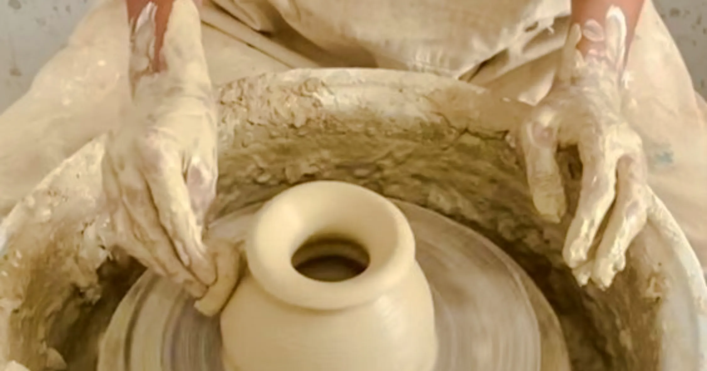 Pottery being shaped on a wheel at a workshop in Douar Dadsi, Marrakesh.