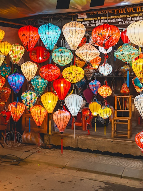Hoi An night market with colorful traditional lanterns on display.