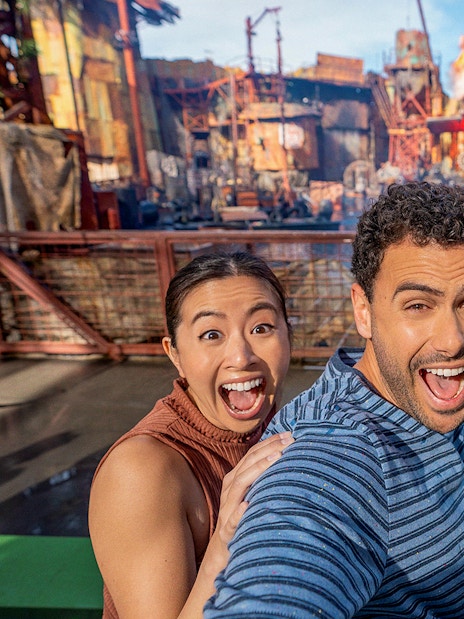 Visitors enjoying a live action show with explosions at Universal Studios Hollywood.