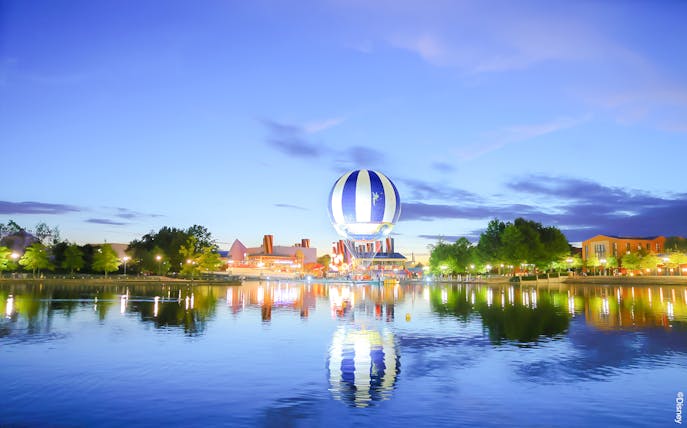 Balloon PanoraMagique over lake at Disneyland Paris, France during twilight.