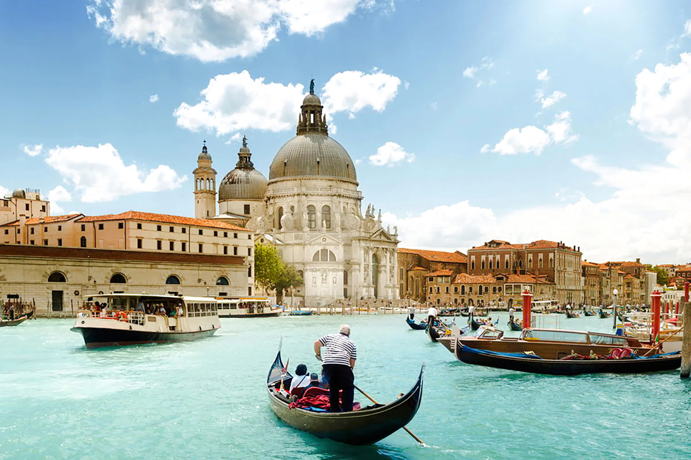 Gondolas on the Grand Canal with Santa Maria della Salute in Venice.