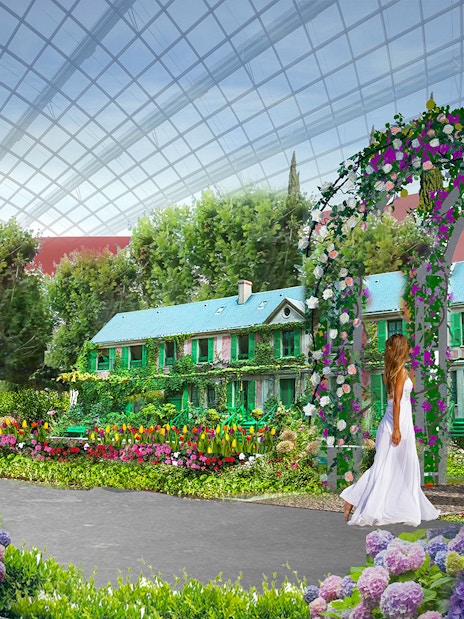 Monet-inspired garden with floral arch and house at Gardens by the Bay exhibition.