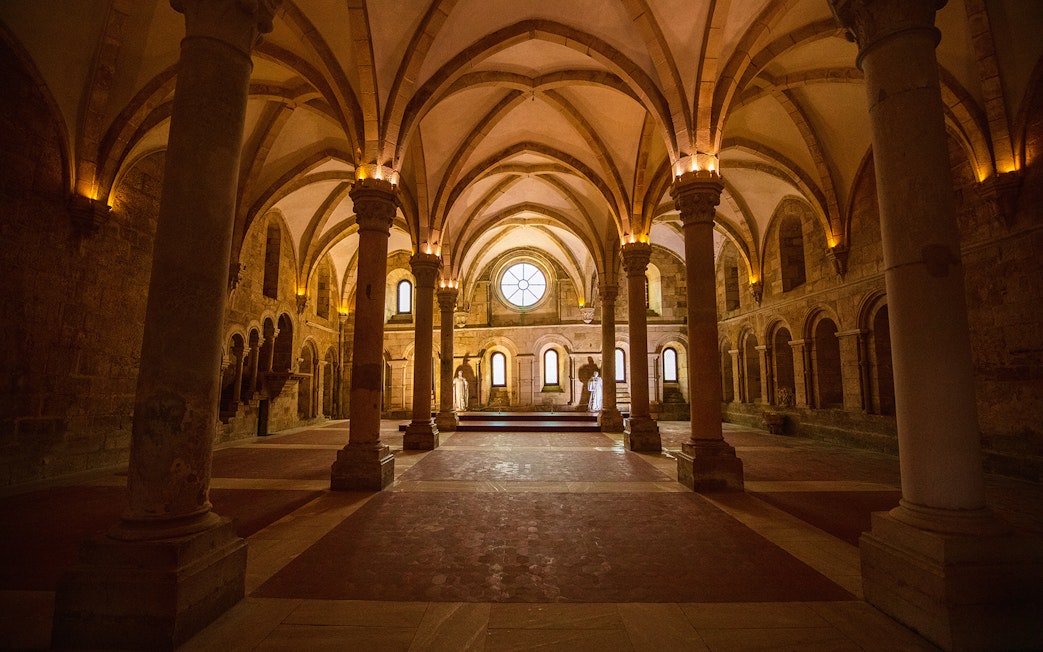Dinning hall with vaulted ceilings and columns at Alcobaça Monastery, Portugal.
